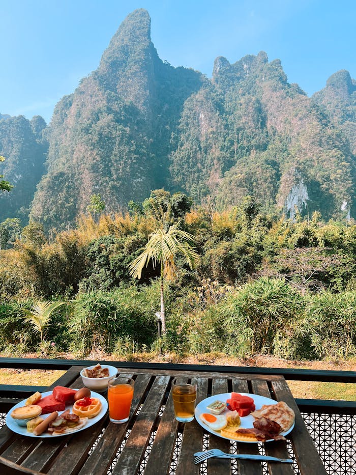 Enjoy a scenic breakfast in nature with a stunning mountain backdrop.